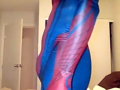 playing in Spiderman suit